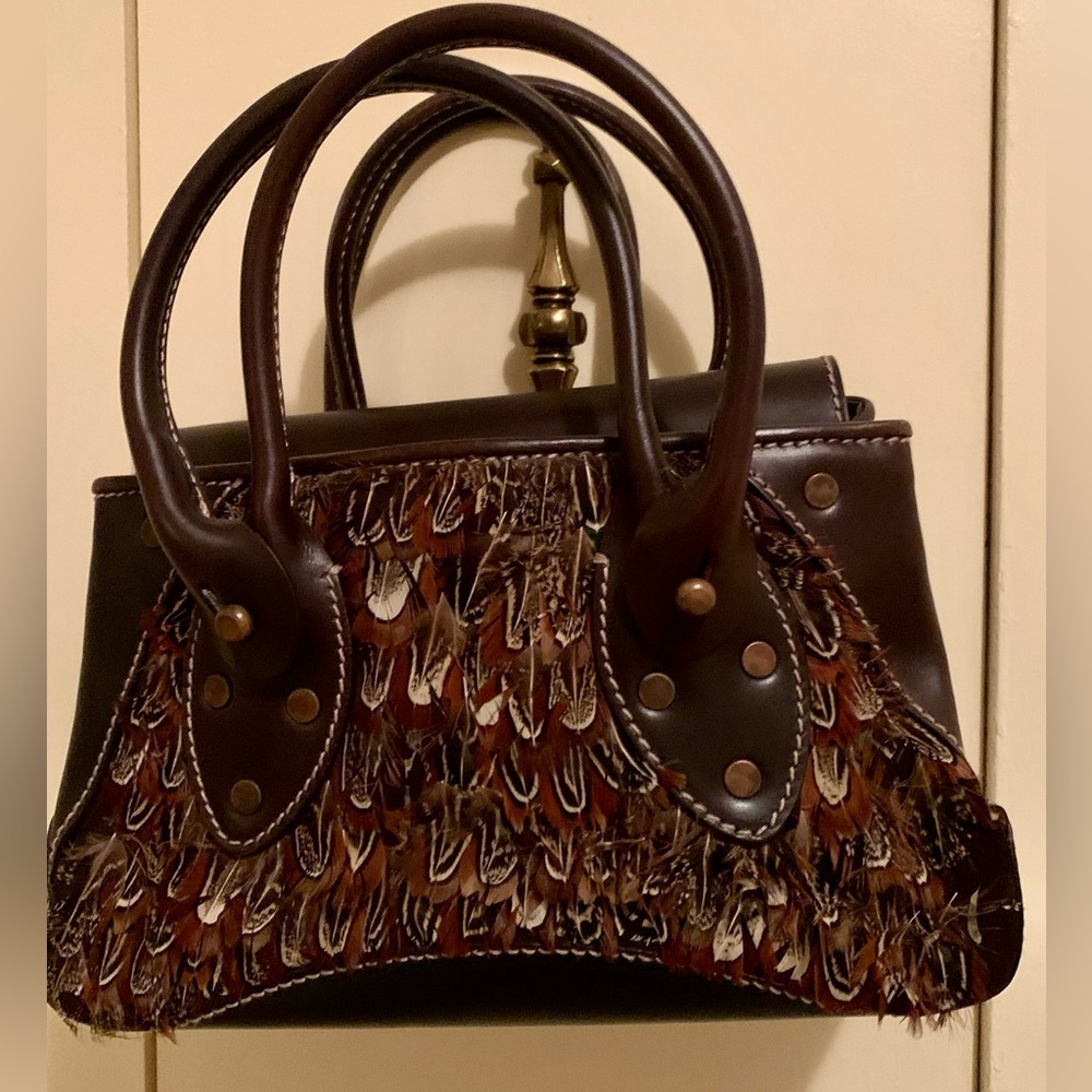 Ruehl No 925 brown leather purse with feathers